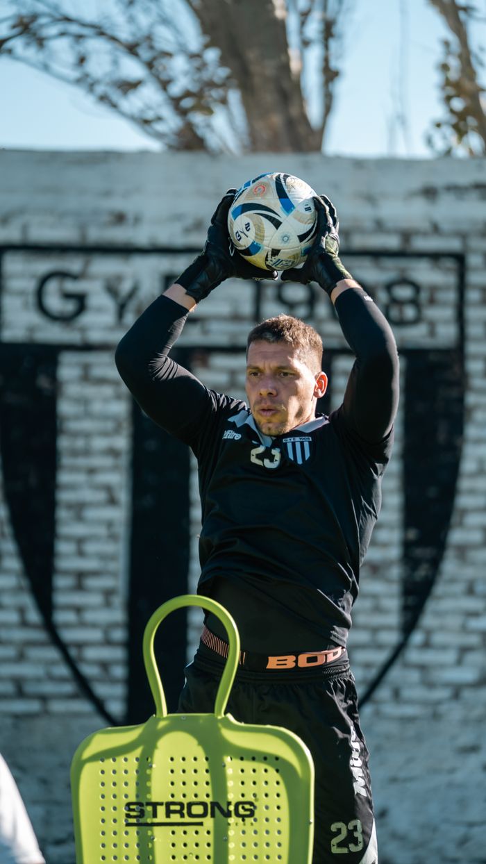 about-02 Goalkeeper in action during soccer practice, preparing to throw the ball.